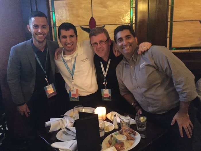 Gus Melendez, Damien Phillippi, and Jayvin Arora at dinner