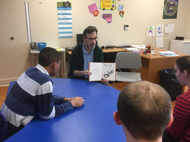 Steve Lane reading to students