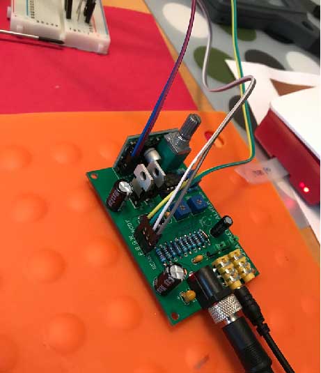 Close up of the Raspberry Pi connected to the Squawker Talker which forwards the audio to the Billy Bass speaker and moves the body