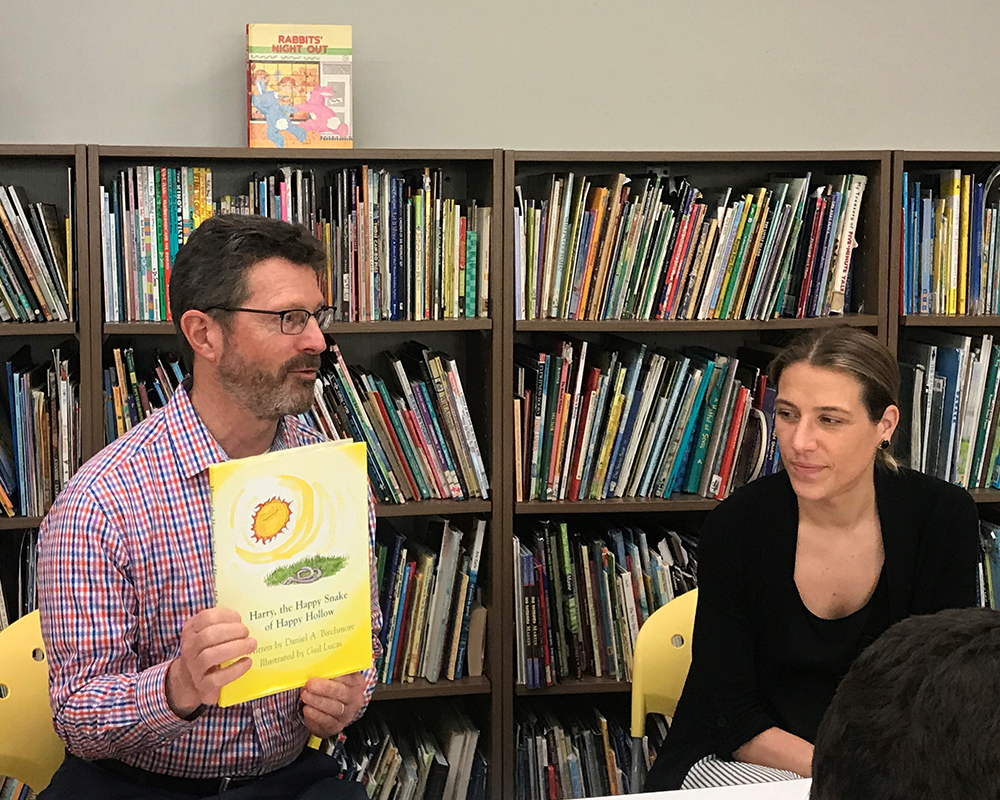 Craig Stabler and Kristen Kelly reading at Devereux Annual Reading Week 2019