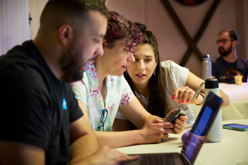 Soliant co-workers, Uriel Gutierrez, Marin Page, and Lauren Heidecke working together